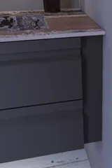 Stort badeværelse inspiration med grå vaskeskab med integreret greb, stilfuld sidestillet håndvask, firkantet spejl med afrundede hjørner, vægge i beton look samt rå materialer giver et urban udtryk